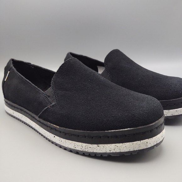 toms black leather slip ons